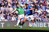 Rangers' Cyriel Dessers and Hibs' Jack Iredale battle for the ball during a Premiership match at Ibrox earlier this month (Picture: Andrew Milligan/PA Wire)