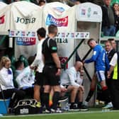 John Lundstram of Rangers leaves the field after being shown a second yellow card.