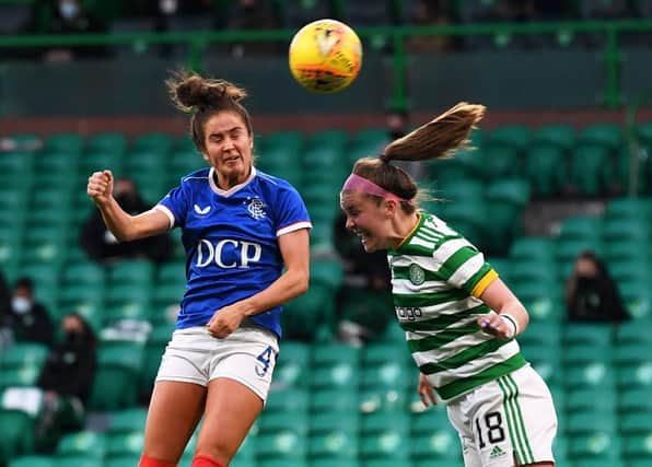 GLASGOW, SCOTLAND - APRIL 21: Rangers' Emma Brownlie (left) competes with Caitlin Hayes during a SWPL match  between Celtic and Rangers at Celtic Park, on April 21, 2021, in Glasgow, Scotland. (Photo by Craig Foy / SNS Group)