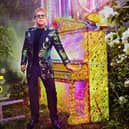 Sir Elton John will now visit Scotland in 2021.