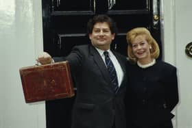 Nigel Lawson, former Chancellor of the Exchequer, with his wife Thérèse outside 11 Downing Street in London on Budget Day, 17th March 1987. (Photo by Fox Photos/Hulton Archive/Getty Images)