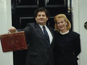 Nigel Lawson, former Chancellor of the Exchequer, with his wife Thérèse outside 11 Downing Street in London on Budget Day, 17th March 1987. (Photo by Fox Photos/Hulton Archive/Getty Images)