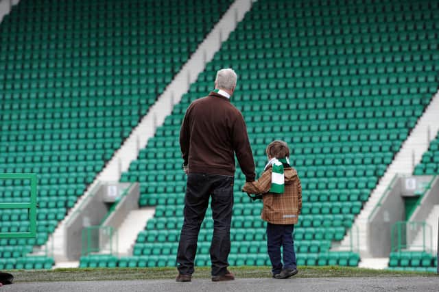 Aidan Smith took his four-year-old son Archie to his first football game when they attended the Edinburgh derby between Hibs and Hearts at Easter Road on January 2, 2012.