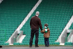 Aidan Smith took his four-year-old son Archie to his first football game when they attended the Edinburgh derby between Hibs and Hearts at Easter Road on January 2, 2012.