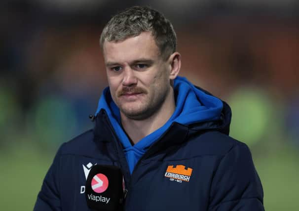 Edinburgh's Darcy Graham on pundit duties for Viaplay during the match against Connacht. (Photo by Ewan Bootman / SNS Group)