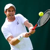 Andy Murray hits a shot during practice at SW19. His campaign begins against James Duckworth on Monday.