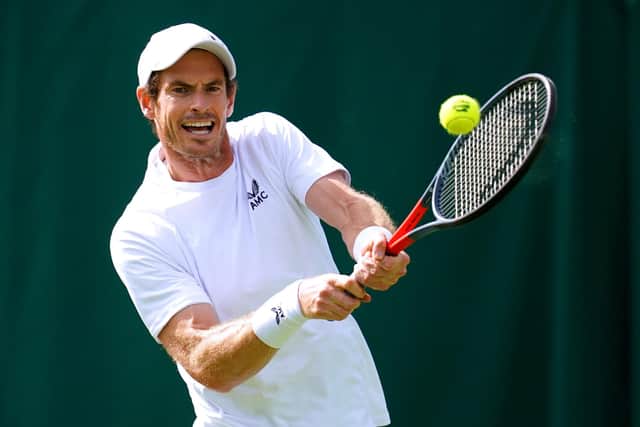Andy Murray hits a shot during practice at SW19. His campaign begins against James Duckworth on Monday.