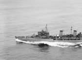 The HMS Edinburgh pictured at Scapa Flow a year before it was scuttled by the Royal Navy in the Arctic Ocean, on May 2 1942. PIC: Imperial War Museum.