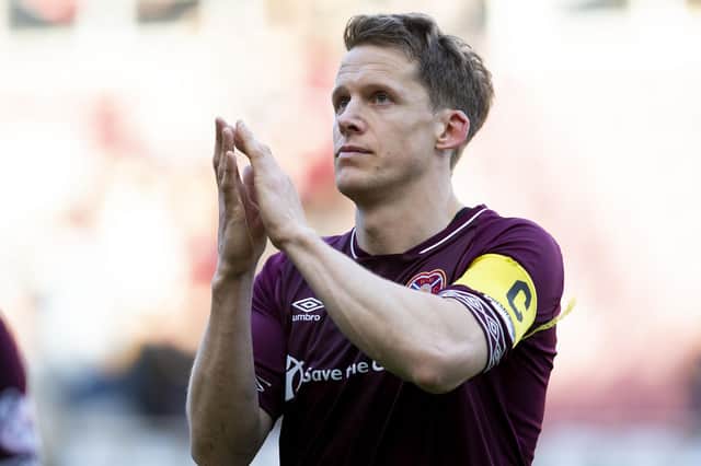Former Hearts skipper Christophe Berra recently announced his decision to retire. Here he applauds the fans after a game v Aberdeen in 2019