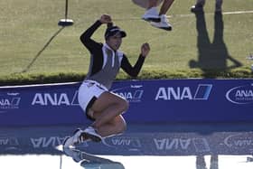 Patty Tavatanakit of Thailand celebrates winning the 2021 ANA Inspiration by taking the traditional leap into Poppie’s Pond. That will be happening for the last time in 2022 before the newly-named Chevron Championship moves to a new home. Picture: Michael Owens/Getty Images.
