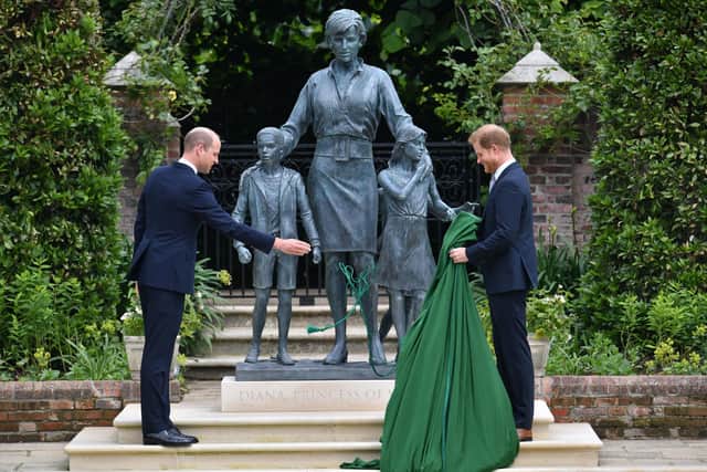 The Duke of Cambridge (left) and Duke of Sussex unveiling a statue they commissioned of their mother Diana.
