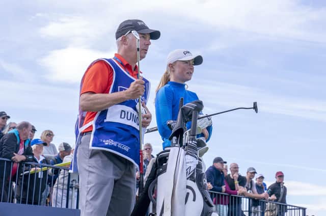 Louise Duncan on the 13th tee with caddie Dean Robertson during day four of the AIG Women's Open at Muirfield. Picture: Jane Barlow/PA Wire.