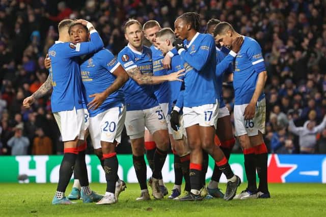 Rangers players celebrate during their Europa League knockout round play-off tie success against Borussia Dortmund last month. (Photo by Alan Harvey / SNS Group)