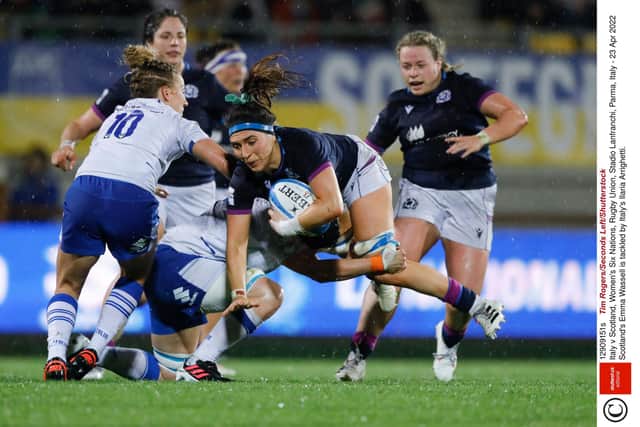 Scotland's Emma Wassell is tackled by Italy's Ilaria Arrighetti. Photo by Tim Rogers/Seconds Left/Shutterstock (12909151s)
