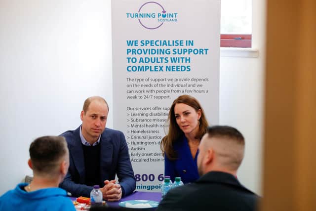 The Duke and Duchess of Cambridge talk to service users during a visit to Turning Point Scotland's social care centre in Coatbridge, North Lanarkshire. (Credit: Phil Noble/PA Wire)
