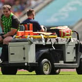 Fraser Brown is carried off after rupturing his ACL while playing for the World XV during the Killik Cup match against the Barbarians at Twickenham Stadium on May 28. (Photo by David Rogers/Getty Images)