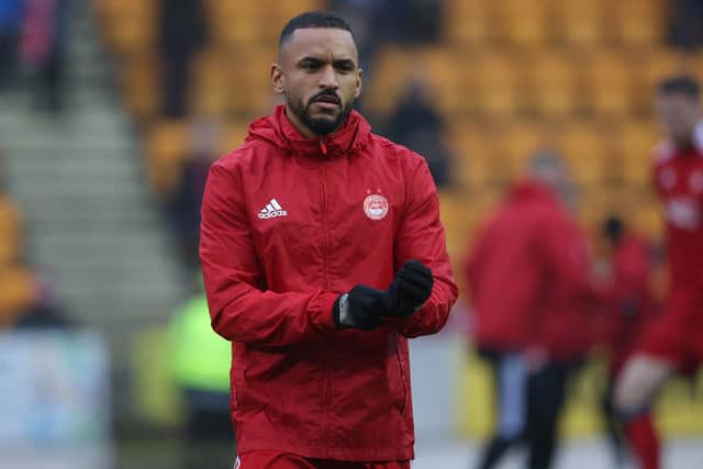 Aberdeen's Funso Ojo has been charged with allegedly assaulting a supporter. (Photo by Craig Williamson / SNS Group)