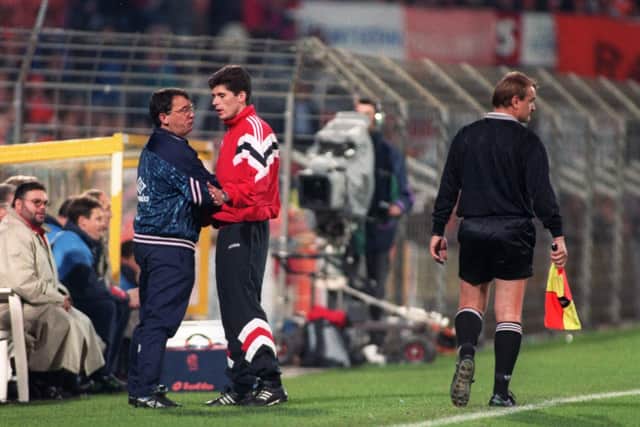 England manager Graham Taylor has words with a FIFA official after Netherlands defender Ron Koeman was not sent off in a crunch World Cup qualifier in 1993 Credit: Shaun Botterill/ALLSPORT