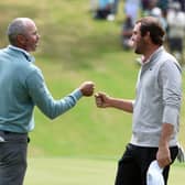 Scottie Scheffler fist bumps Matt Kuchar after winning their match to make the final of the World Golf Championships-Dell Technologies Match Play at Austin Country Club in Texas. Picture: Steve Dykes/Getty Images.