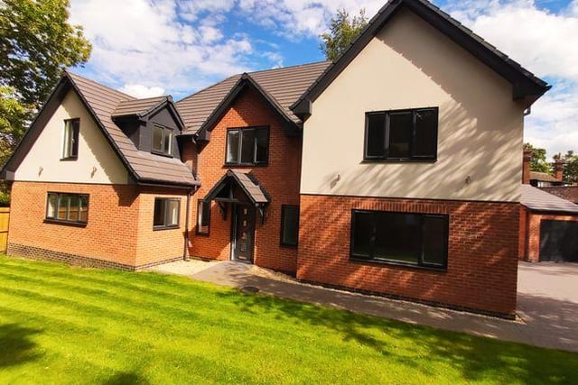 This five bedroom new build has a modern open plan layout and separate study, living room and dining room. Marketed by Strike, 0113 482 9379.