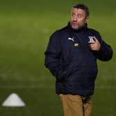 Inverness Caledonian Thistle manager John Robertson - still signing tickets  (Photo by Ross MacDonald / SNS Group)