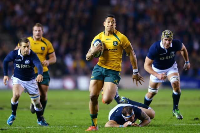 Israel Folau in action for Australia against Scotland at Murrayfield in 2013. Picture: Mark Runnacles/Getty Images