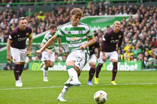 Arne Engels strokes home the opener against Hearts from the spot on his full debut for Celtic  (Photo by Rob Casey / SNS Group)