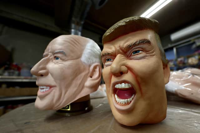 Rubber masks of US President-elect Joe Biden and Donald Trump (Picture: Behrouz Mehri/AFP via Getty Images)