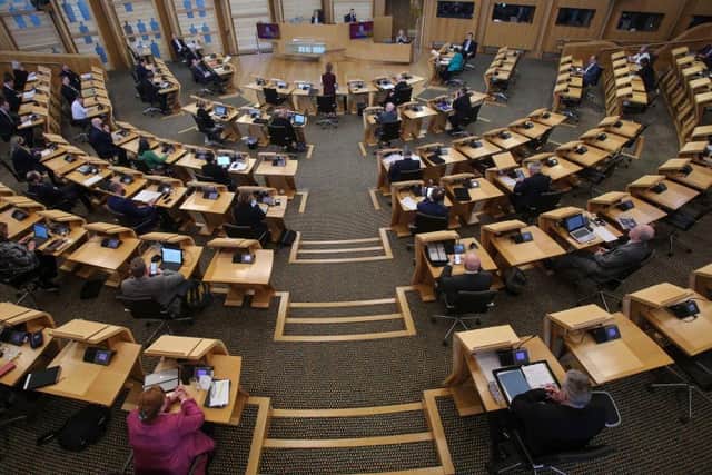 The Holyrood chamber where MSPs gather to make law for the people of Scotland (Picture: Fraser Bremner - Pool/Getty Images)