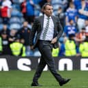 Celtic manager Brendan Rodgers strides onto the Ibrox pitch following the 1-0 win over Rangers. (Photo by Alan Harvey / SNS Group)
