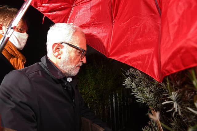 Former Labour leader Jeremy Corbyn arrives at his house in North London after being suspended from the party
