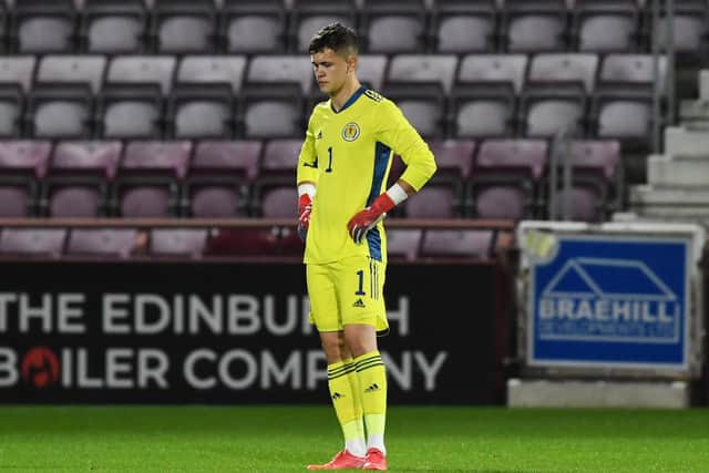 Scotland U-21 keeper Cieran Slicker was a dejected man after conceding the only goal of the match in the European Championship qualifier against Denmark.  Photo by Craig Foy / SNS Group
