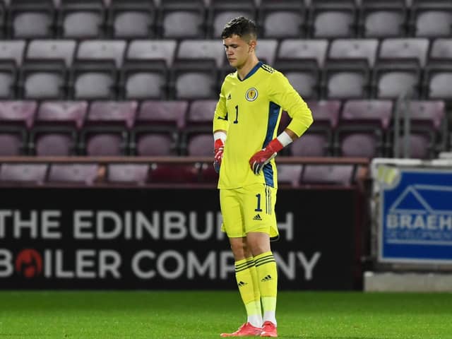 Scotland U-21 keeper Cieran Slicker was a dejected man after conceding the only goal of the match in the European Championship qualifier against Denmark.  Photo by Craig Foy / SNS Group