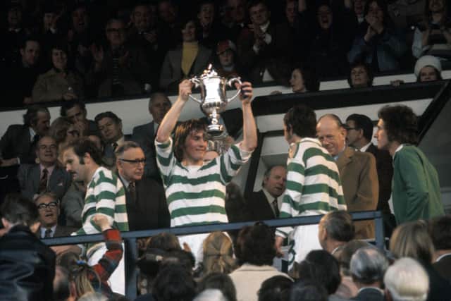 Celtic striker Kenny Dalglish lifts the Scottish Cup after a 3-1 win over Airdrie at Hampden in 1975. Pic: SNS
