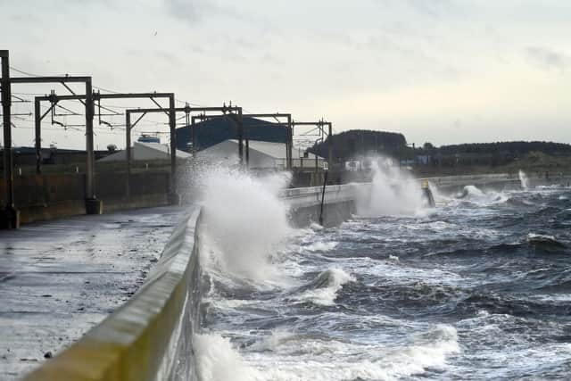 Gusting winds and high tides driven by Storm Barra has led to a string of flood warnings. Pic: John Devlin