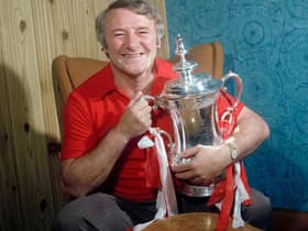 Tommy Docherty with the FA Cup after Manchester United's win in 1977