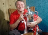 Tommy Docherty with the FA Cup after Manchester United's win in 1977