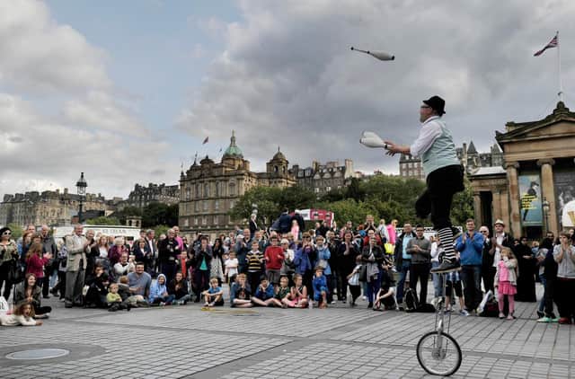 Free Fringe shows have been staged on The Mound precinct by performers for decades but festival organisers have faced a backlash after it emerged a  a  pop-up Johnnie Walker bar will be created as part of a temporary open-air venue in the space. PIC: Ian Rutherford.