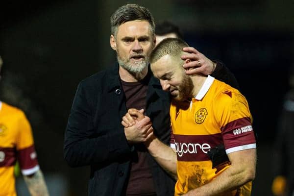 Motherwell manager Graham Alexander with Allan Campbell at full-time during a Scottish Premiership match between Ross County and Motherwell. (Photo by Alan Harvey / SNS Group)