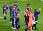 John McGinn and David Marshall of Scotland interact after the draw at England.