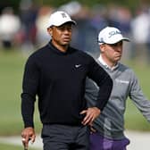 Tiger Woods and Justin Thomas wait to putt on the first green during the second round of the The Genesis Invitational at Riviera Country Club in Pacific Palisades, California. Picture:  Michael Owens/Getty Images.