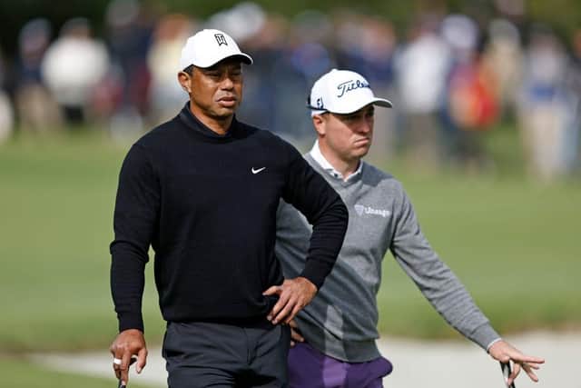 Tiger Woods and Justin Thomas wait to putt on the first green during the second round of the The Genesis Invitational at Riviera Country Club in Pacific Palisades, California. Picture:  Michael Owens/Getty Images.