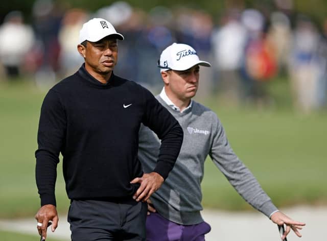 Tiger Woods and Justin Thomas wait to putt on the first green during the second round of the The Genesis Invitational at Riviera Country Club in Pacific Palisades, California. Picture:  Michael Owens/Getty Images.
