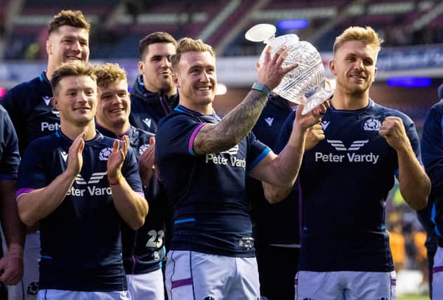 Scotland captain Stuart Hogg lifts the Hopetoun Cup following the win over Australia. (Photo by Ross Parker / SNS Group)