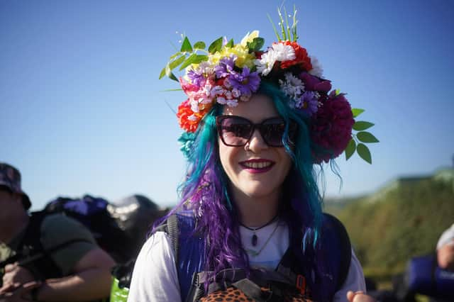 People arrive on the first day of the Glastonbury Festival at Worthy Farm in Somerset. Picture date: Wednesday June 22, 2022.