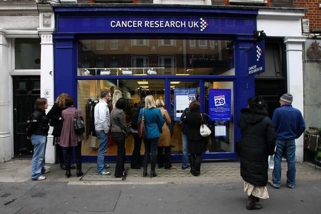 Cancer Research UK shops, donations, legacies, and other forms of income helped the charity raise a total of £668 million in 2021/22 (Picture: Gareth Cattermole/Getty Images)