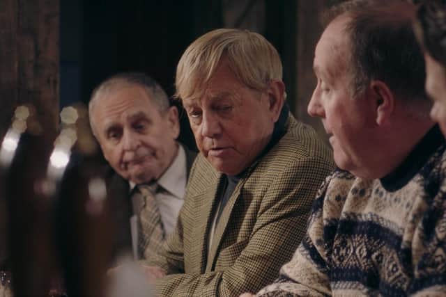 Sylvester McCoy, Frazer Hines, Alasdair McCrone and Kenny Boyle as revellers at the bar in the Clachaig Inn, Glencoe.