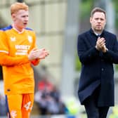 Rangers manager Michael Beale applauds fans at full time after overcoming St Mirren.