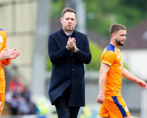 Rangers manager Michael Beale applauds fans at full time after overcoming St Mirren.