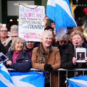 Members of the public and pro-independence supporters gathered to pay their respects outside the public memorial service for former first minister Alex Salmond on Saturday (Picture: Jane Barlow - Pool/Getty Images)